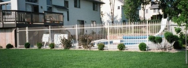 2 Rail Ornamental Iron Fence Surrounds Pool