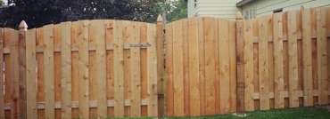 Alternating Flat Topped Board Privacy Fence