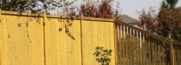 Side-by-Side Boards on Wood Privacy Fence