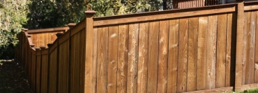 King Style Wood Privacy Fence Follows Contours In Yard