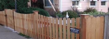 Scalloped Cedar Fence With Caps