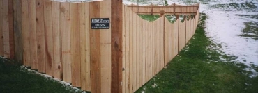 4 Foot High Solid Board Scalloped Cedar Privacy Fence and Topped Posts