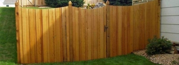 Batten Wood Fence With Traditional Tops