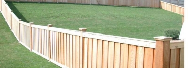 Batten Fence With Decorative Caps