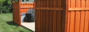 Batten Wood Privacy Fence with Rail and Caps