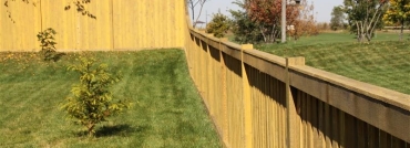 Alternating Wood and King Style Fence