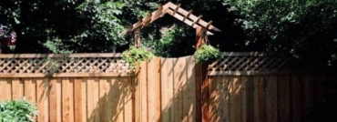 Lattice Top Wood Fence With Gate and Awning